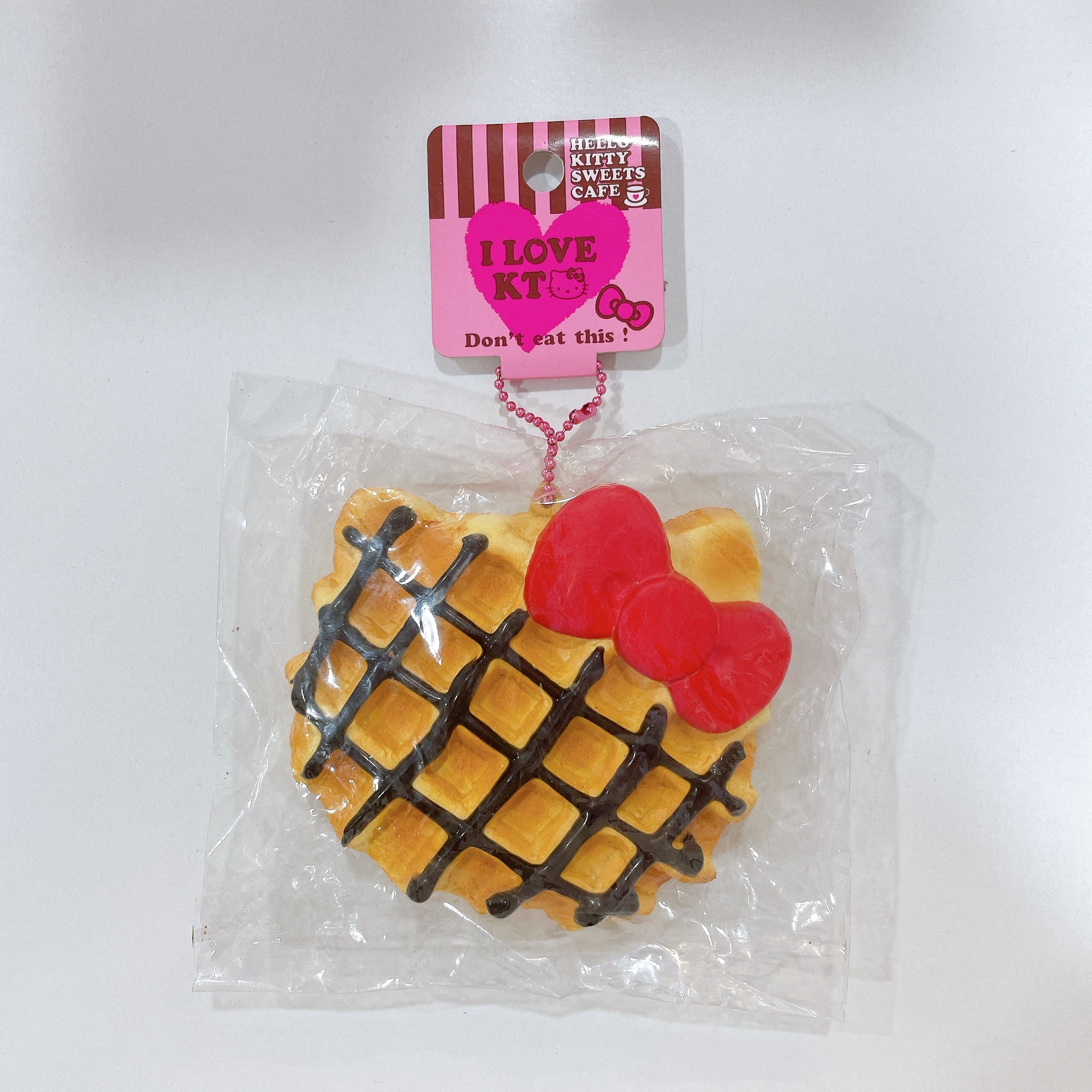 Hello Kitty Waffle Squishy (Red Ribbon, Chocolate Drizzle, 2010 License)